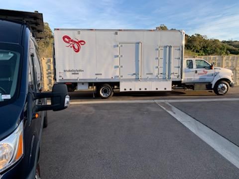 Profile of the large truck with Snakebyteproductions.film marketing.